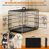 A dog cage with dimensions shown, and three small dogs in front of it. Produktbild-Vorschau