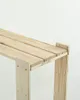 Close-up of the top corner of a wooden shelf unit. Produktbild-Vorschau