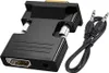 A black HDMI to VGA adapter with an audio output and a separate black audio cable with two 3.5mm jacks. Voir les images du produit