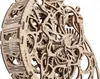 A close-up view of a wooden mechanical clock model, showcasing intricate gears and wooden construction. Voir les images du produit