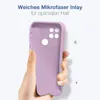 A hand is holding a purple phone case, showing its interior. Produktbild-Vorschau