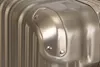 A close-up shot of the corner of a metallic suitcase. Podgląd zdjęcia produktu