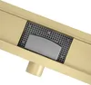 Close-up of a shower drain with a gold-colored frame and a gray grate and cover. Podgląd zdjęcia produktu