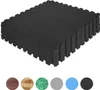 A stack of black interlocking foam mats. Náhled obrázku produktu
