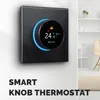 A smart thermostat mounted on a wall, with a modern interior setting in the background. Produktbild-Vorschau
