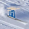 A ski bock sled is shown on a snowy slope, with snow spraying up. Anteprima dell’immagine prodotto