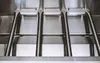 A close-up view of the interior of a stainless steel grill, showing three burner tubes and grates. Produktbild-Vorschau