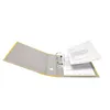 An open yellow binder with papers inside, isolated on a white background. Voir les images du produit
