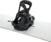 A black snowboard binding is attached to a white snowboard. Podgląd zdjęcia produktu