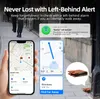A person holding a phone displaying a map, with various pop-up notifications and images of a wallet and a tracker. Produktbild-Vorschau
