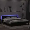 A bedroom scene at night with a bed featuring LED lighting. Anteprima dell’immagine prodotto