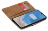 A book-style phone case with cards inserted, showing a smartphone screen. Produktbild-Vorschau