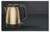 A copper and black electric kettle is displayed against a dark gray background. Produktbild-Vorschau