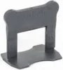A single gray tile leveling clip with the brand name 'Kubala' embossed on it. Produktbild-Vorschau