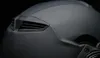 A close-up shot of a matte black helmet. Voir les images du produit