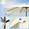 A marketing image showing a beige umbrella with close-up details of its features and a hand adjusting it. Produktbild-Vorschau