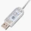 A close-up of a USB connector with a transparent casing and a button. Podgląd zdjęcia produktu