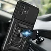 A black phone case with a ring stand and camera cover is shown attached to a magnetic car mount, with a blue electrical effect between the case and mount. Produktbild-Vorschau