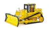 A yellow and black toy bulldozer made of metal construction parts, shown from a three-quarter front angle on a white background. Anteprima dell’immagine prodotto