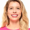 A close-up portrait of a woman smiling. Podgląd zdjęcia produktu