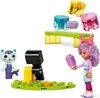 A collection of toys, including figures and building blocks, arranged on a white background. Produktbild-Vorschau