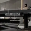 A close-up view of the control panel of an electric standing desk, showing buttons and a digital display. Produktbild-Vorschau