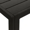 A close-up view of the corner of a black table, showing the slatted surface and the frame. Produktbild-Vorschau
