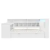 A white bed frame with integrated shelving and drawers, shown from the front. Náhled obrázku produktu