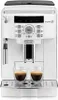 A white De Longhi Magnifica S coffee machine with two cups of espresso. Produktbild-Vorschau