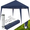 A navy blue pop-up gazebo and its accessories are laid out on a white background and a patch of grass. Náhled obrázku produktu