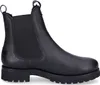 A black leather Chelsea boot with a thick sole. Produktbild-Vorschau