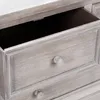 A close-up view of a wooden dresser with two drawers, one of which is open. Podgląd zdjęcia produktu