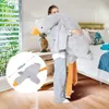 A person is holding a large plush goose in a bedroom. Náhľad obrázku produktu