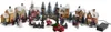 A festive Christmas village scene with illuminated houses, trees, and figures. Produktbild-Vorschau
