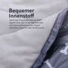Close-up of the inner lining of a dog sleeping bag, showing the fabric texture and a printed pattern on the outer layer. Podgląd zdjęcia produktu