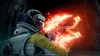 A person in a futuristic suit is firing a weapon at an alien creature in a dark, atmospheric environment. Produktbild-Vorschau