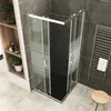 A modern bathroom with a glass shower enclosure, a towel rack, and shelving with plants and toiletries. Produktbild-Vorschau