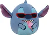 A plush toy of Stitch from Lilo & Stitch wearing sunglasses and eating ice cream. Voir les images du produit