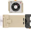 A temperature controller and its base are shown against a white background. Anteprima dell’immagine prodotto