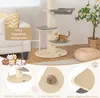 A kitten playing on a cat tree in a living room setting. Podgląd zdjęcia produktu