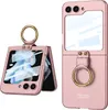 A pink flip phone case with a gold ring holder is shown open and closed against a white background.