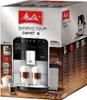 The image shows the retail packaging of a Melitta Caffeo Barista T Smart F831-101 coffee machine. The packaging displays the product prominently, along with branding and feature highlights. Produktbild-Vorschau