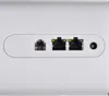 A close-up view of the back panel of a white electronic device, showing various ports. Produktbild-Vorschau