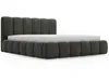 A dark gray upholstered bed frame with a mattress, shown from a side angle against a white background. Produktbild-Vorschau
