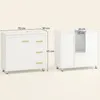 Two views of a white bathroom cabinet with golden handles, shown with dimensions. Produktbild-Vorschau