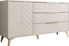 A light gray dresser with a chevron patterned door and three drawers is shown from a side angle against a white background. Náhľad obrázku produktu