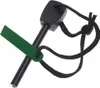 A close-up studio shot of a magnesium fire starter with a green striker and black cord, isolated on a white background. Náhled obrázku produktu
