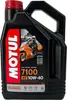 A black plastic container of Motul 7100 4T 10W-40 4-stroke motor oil, featuring an image of two people riding a motorcycle. Podgląd zdjęcia produktu