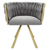 A studio shot of a gray upholstered chair with gold legs. Produktbild-Vorschau
