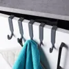 Over-the-door hooks holding towels and a pot holder. Podgląd zdjęcia produktu